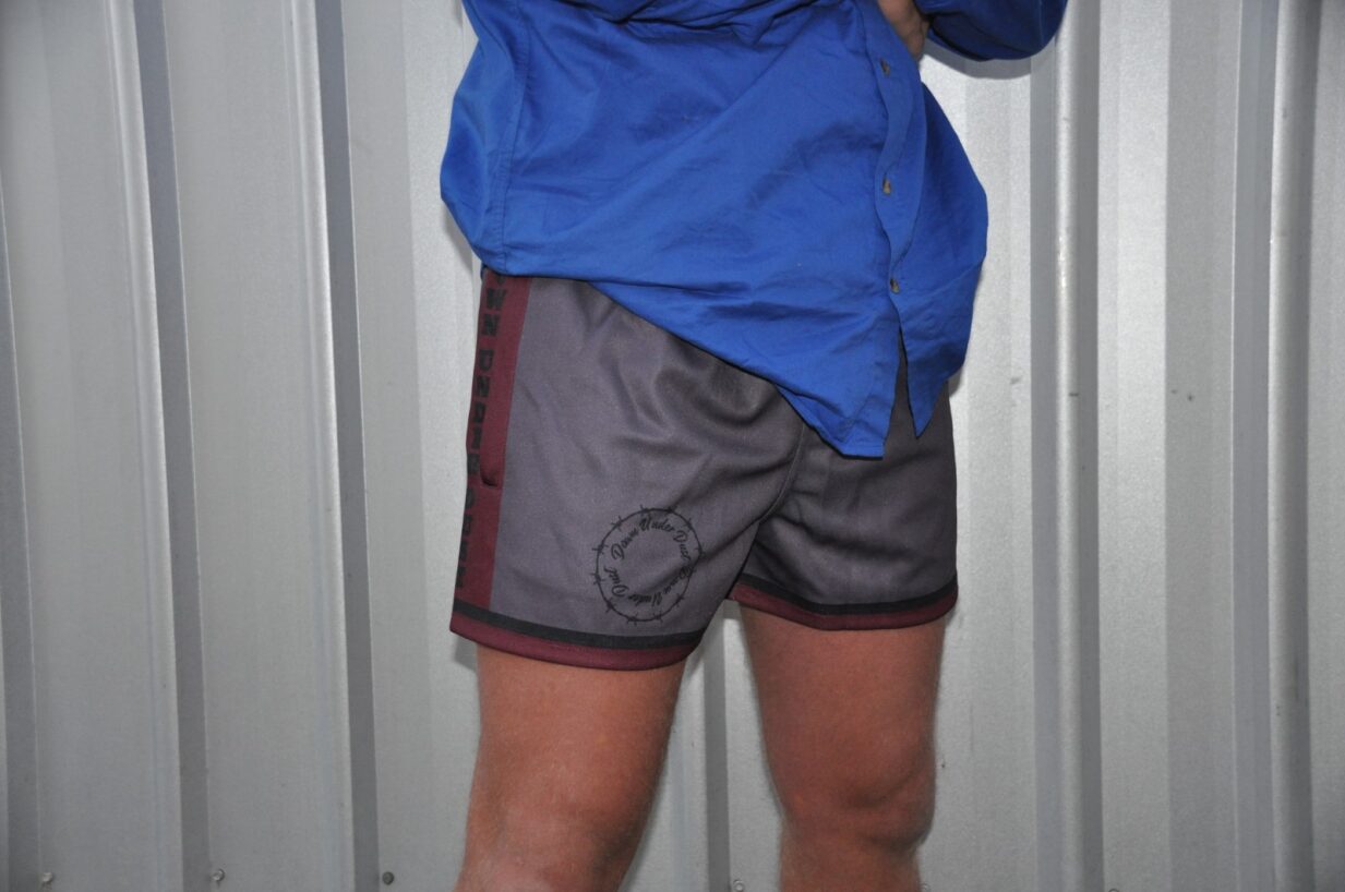 Maroon and grey footy shorts